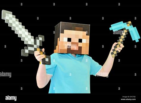 Minecraft Steve With An 8 Bit Sword And Pick Axe Stock Photo Alamy