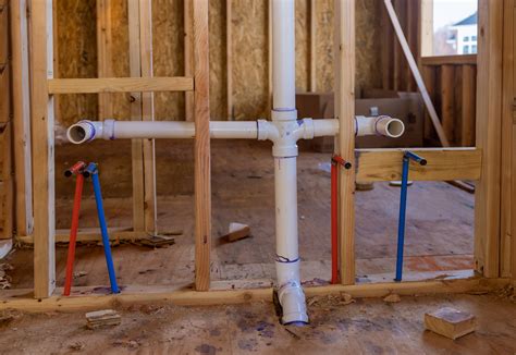 Home Construction With Hot And Cold Blue And Red Pex Pipe Layout In