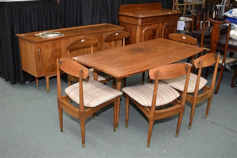 Mid century modern teak dining set including drop leaf table, six ...