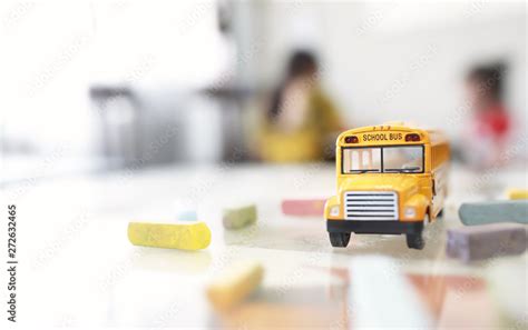 Yellow school bus toy model.Hi-key and very shallow depth of field ...