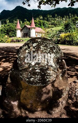 Stone Statue On The Island Of Nuku Hiva In The Marquesas Stock Photo