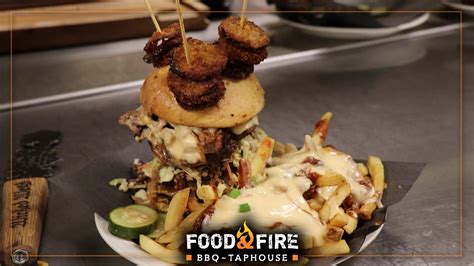 The Tower Of Q Burger Food And Fire Bbqtaphouse Shoppes At Montage