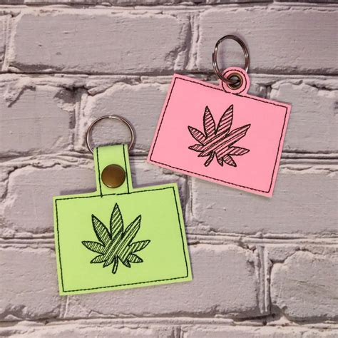 Colorado Wyoming Cannabis Keyfobs Snap Tab Eyelet Keyfob