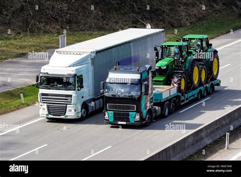 Trucks On The Highway Transport On The Street For Goods Lastwagen