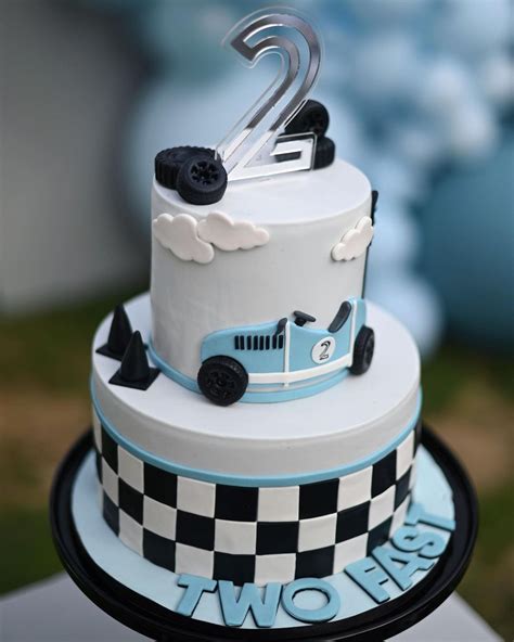 Blue And White Checkerboard Two Tiered Cake For Cars Themed Birthday Party