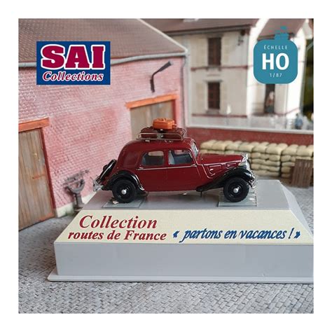 Citroën Traction 1935 rouge et noire avec galerie de toit HO SAI 1811