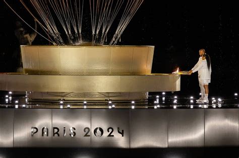 Marie Jose Perec And Teddy Riner Light Olympic Cauldron