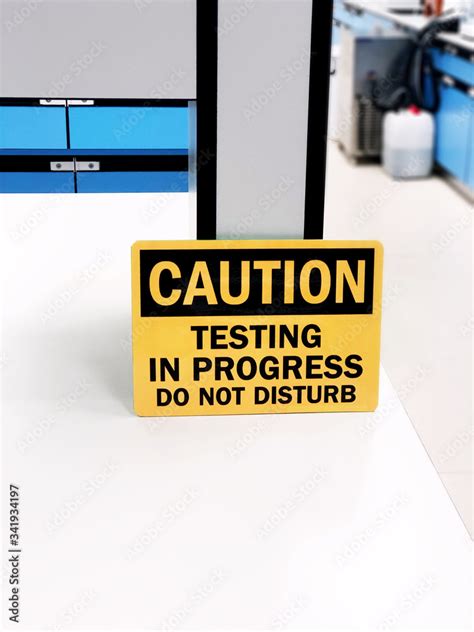 Caution Testing In Progress Do Not Disturb A Safety Sign Warning On