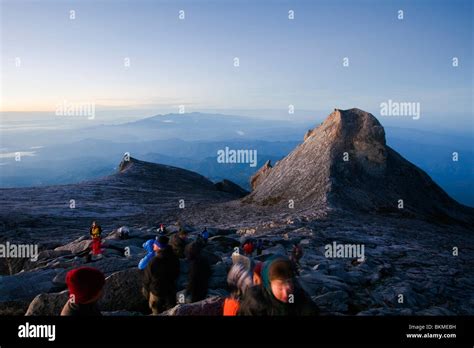 Climbers At Low S Peak On The Summit Of Mt Kinabalu At Dawn Kinabalu