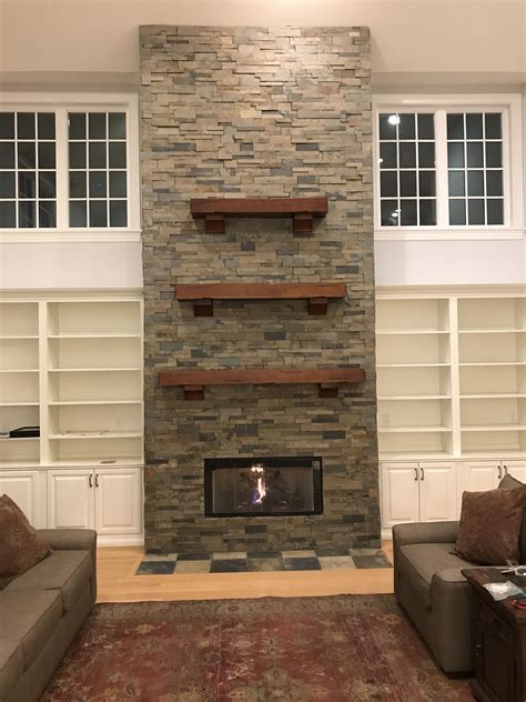 Modern Stacked Stone Fireplace - TheGouchereye