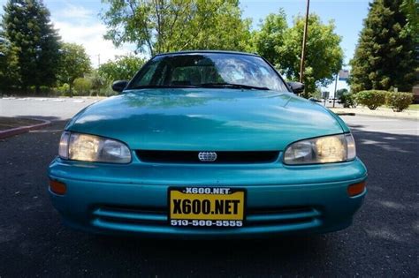 Geo Prizm Miles Polynesian Green Metallic With Miles