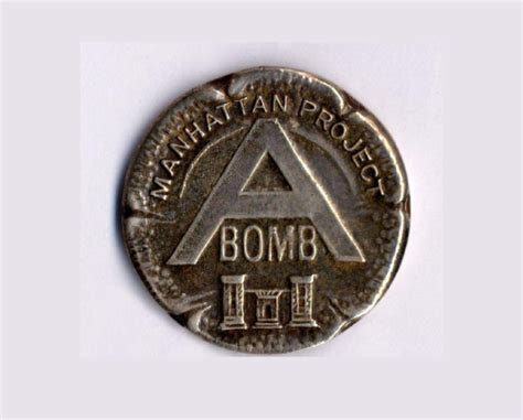 Manhattan Project Bomb Pin | International Spy Museum