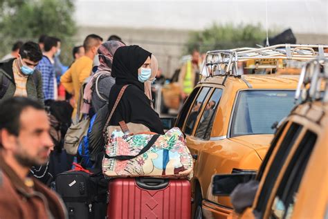 GAZA CITY, GAZA – NOVEMBER 02: Gazans wait in line with their vehicles ...