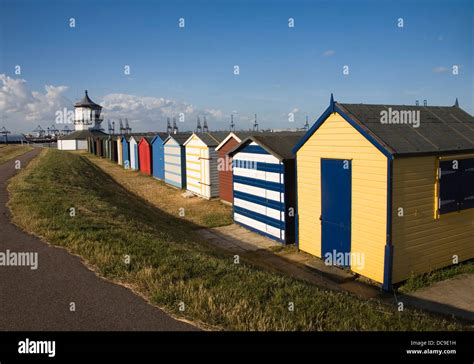 Colourful Seaside Beach Huts And Low Lighthouse Maritime Museum Harwich