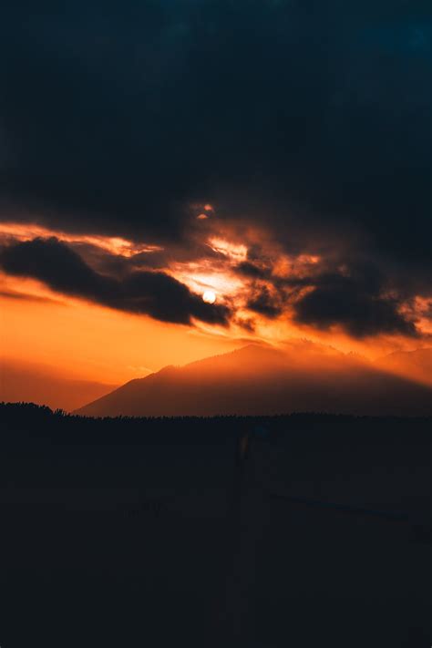 Silhouette of a Mountain during Sunset · Free Stock Photo