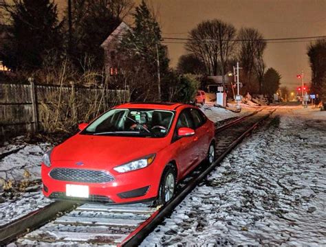 Car Driving On Train Tracks Gets Stuck Blocks Freight Traffic