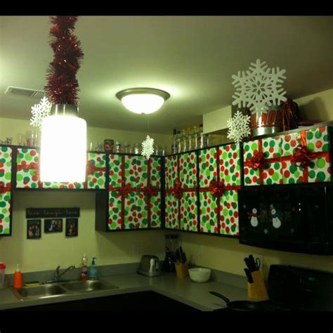 Wrapping Paper On Cabinets Plus Some Fun Bows Love The Garland On The