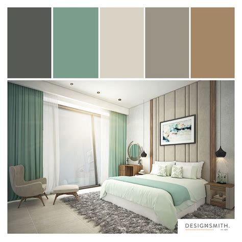 a bedroom with green curtains and white bedding, along with a chair in ...