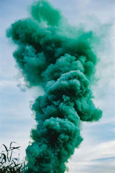 Download A Green Smoke Cloud Is Blowing In The Sky