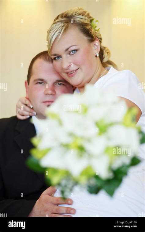 Beautiful Young Wedding Couple Bride With Her Groom And Wedding