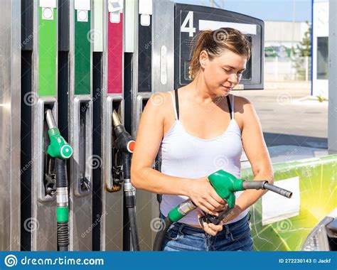 Woman Filling Up Tank Of Her Car With Gasoline Stock Image Image Of