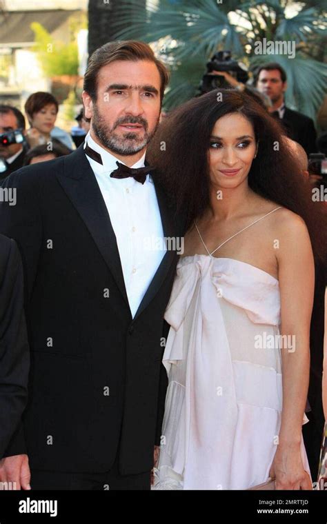 Eric Cantona and wife Rachida Brakni attends the premiere of "Looking ...