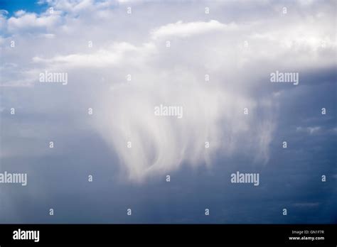 Cloud falling from the sky Stock Photo - Alamy