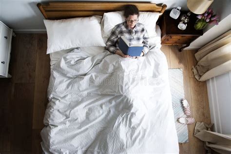 Caucasian Woman on Bed Reading a Book Stock Photo - Image of happiness ...