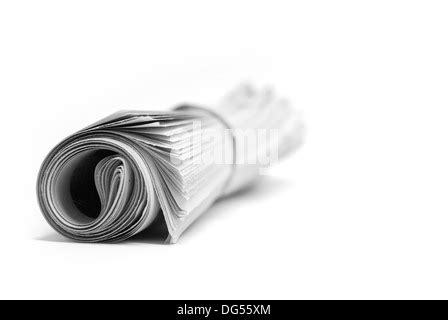 Rolled Up Newspaper With Rubber Band Of The Daily News Isolated On A