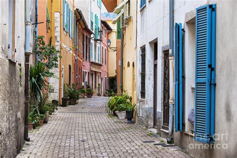 Old town street in Villefranche-sur-Mer Photograph by Elena Elisseeva ...