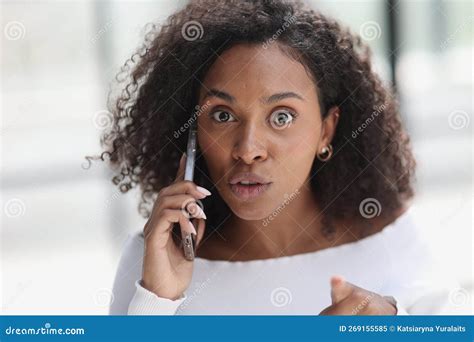 Portrait Of A Young Attractive African American Woman Talking On The