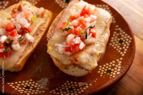 Molletes Mexican Recipe Based On Bolillo Bread Split Lengthwise