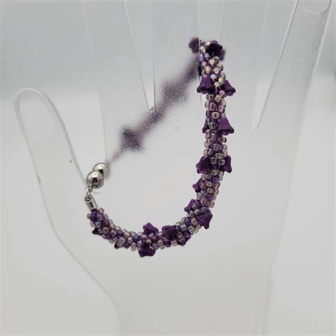 Kumihimo Bracelet with Purple Flowers – Main Avenue Galleria & School ...