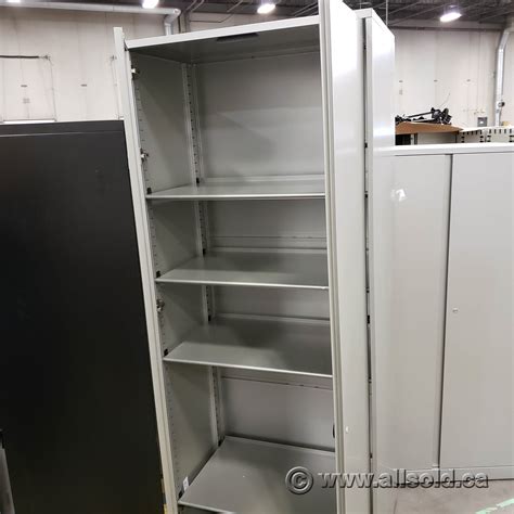 Steelcase 84 In Silver 2 Door Storage Cabinet Locking Allsoldca Buy And Sell Used Office