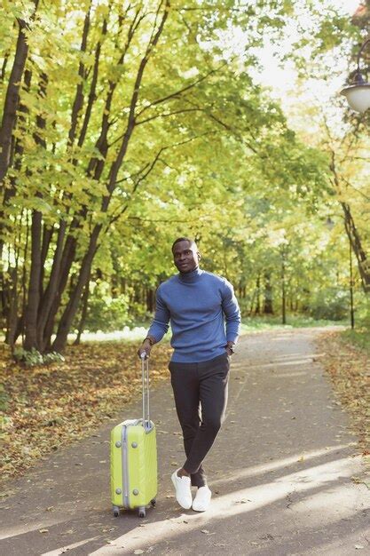 Premium Photo Rear View Of Man Standing In Park