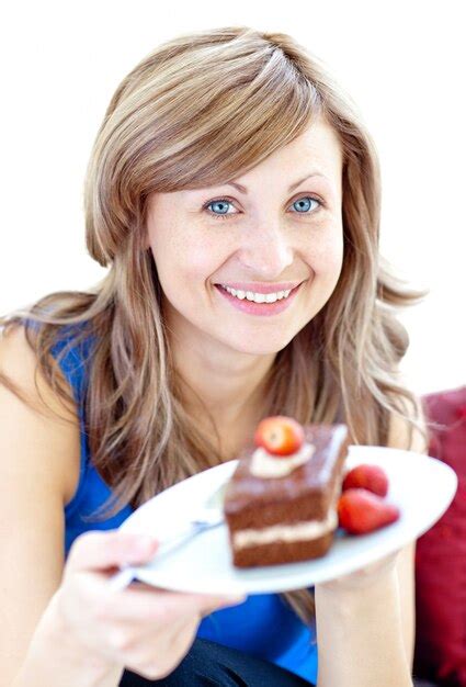 Premium Photo Smiling Woman Holding A Piece Of Chocolate Cake