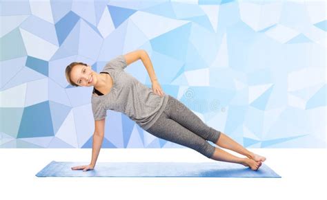 Woman Making Yoga In Side Plank Pose On Mat Stock Image Image Of