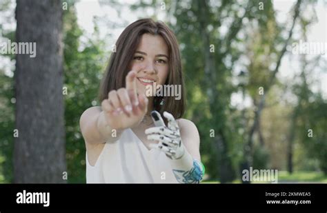 Girl With Bionic Hand Is Posing For Selfie Bionics Cybernetic Robotic