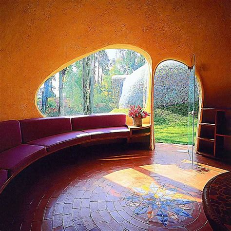 A Living Room Filled With Lots Of Furniture And Windows