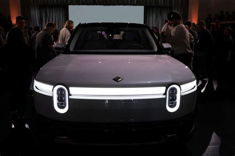 Ev Maker Rivian Unveils Smaller Less Expensive Suvs Crossovers