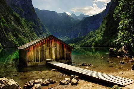 Royalty Free Photo Brown Sheds And Bench Beside River Pickpik