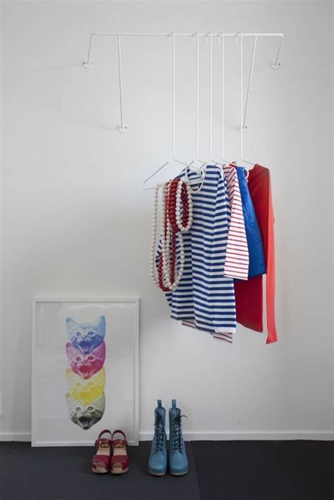 Clever, Imaginative Coat Hanger Concepts | White clothing rack, Diy ...