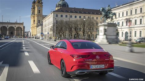 2020 Mercedes Benz Cla 250 4matic Coupe Amg Line Color Jupiter Red Rear Three Quarter Caricos