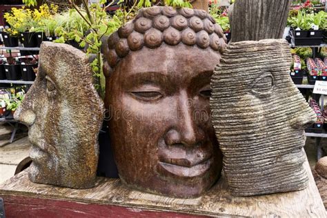 Large Cement Sculptured Face Garden Decor For Sale At A Garden Market