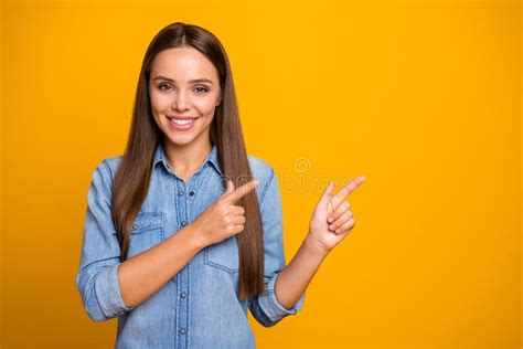 Portrait Of Positive Cheerful Girl Promoter Point Index Finger