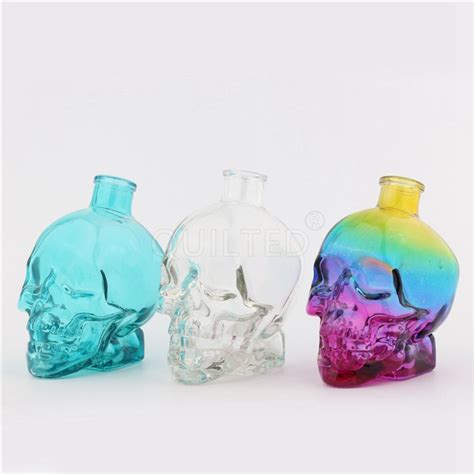 China Skull Shape Liquor Glass Whisky Bottle With Lid Manufacturer And