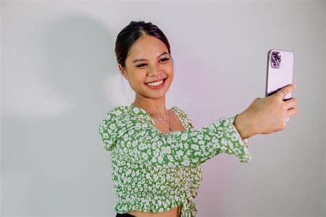 Pretty Asian Girl Take A Self Portrait With Her Smart Phone Thai Girl