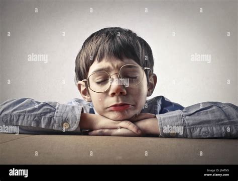 Sad boy crying Stock Photo - Alamy