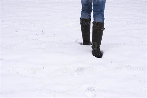 Boots Trudging Through Snow 12830602 Stock Photo At Vecteezy