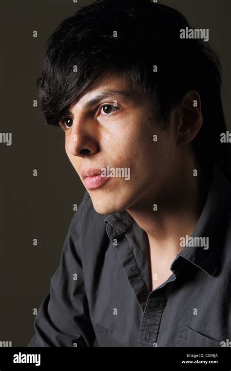 Moody Dark Close Up Portrait Of Young Good Looking Male Model Stock